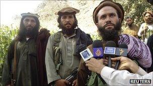 A Pakistani Taliban group commander who holds 23 teenagers hostage, speaks to the media in the Afghanistan-Pakistan border area of Kunar and Bajaur tribal region September 6, 2011.