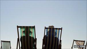 Sunbathers on deck chairs - generic