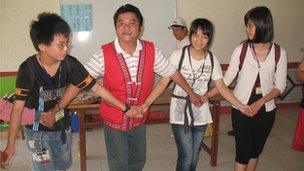 Students taking part in traditional dance