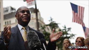 Herman Cain speaks to the media in New York City on 3 October 2011