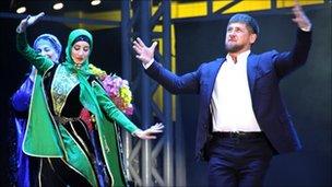 Chechen leader Ramzan Kadyrov (right) dances during the party in Grozny 5 Oct 2011