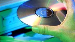 CD being placed in computer