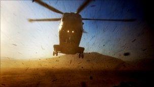 A Merlin HC 3 performs a dust landing near El Centro, California