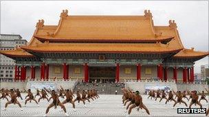 Taiwanese soldiers practice during a National Day rehearsal at the Chiang Kai-shek Memorial Hall in Taipei on 5 October 2011