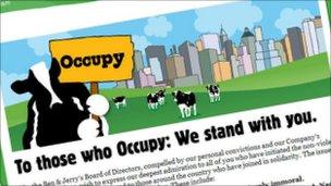 A cow holds a protest sign on Ben & Jerry's blog