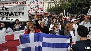 Greek Red Cross workers demonstrate in front of the Greek Parliament the Greek Parliament on October 11, 2011.