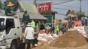 Truck delivery sand and sand bags. Photo: Robert Eden