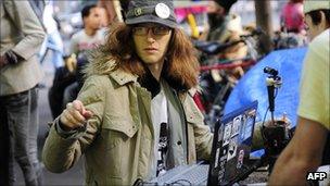 A woman runs an internet stream at Occupy Wall Street in New York