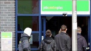 Young people outside a job centre