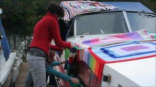 Boat covered in knitting, Milestones Trust