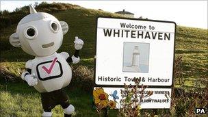 Switchover mascot Digit Al at Whitehaven town limits