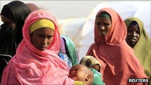 Newly arrived Somali refugees queue to receive the measles vaccine from the Medecins Sans Frontieres (MSF) at the Ifo extension refugee camp in Dadaab, near the Kenya-Somalia border August 1, 2011