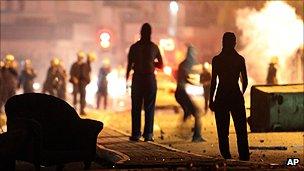 (File photo: September 2011) Protesters fight with police on the outskirts of Bahrain's capital