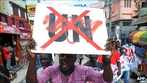 Haitians demonstrate in Port-au-Prince against the UN mission in Haiti on 23 September 2011