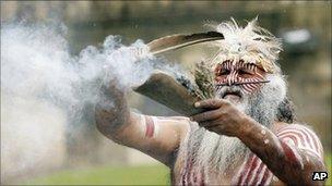 Aboriginal elder Major Sumner performs a smoking ceremony outside the World Museum following the return of an Australian indigenous human skull in Liverpool, England, 13 May 2009