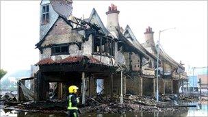 The burnt-out shell of the House of Reeves furniture store in Croydon