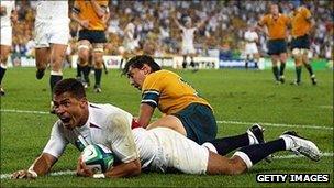 Jason Robinson crosses the line to score his try for England against Australia in the 2003 Rugby World Cup final