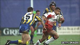 Jason Robinson of Wigan breaks through the Warrington defence during the Regal Trophy final in 1995