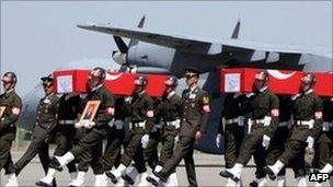 Turkish troops carrying the coffins of soldiers killed in a PKK attack. File photo