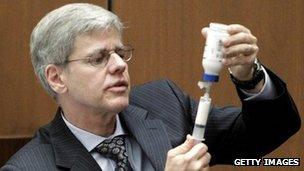 Dr Steven Shafer demonstrates to a jury how propofol is administered on 19 October 2011