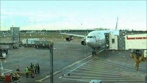 The plane carrying the teenagers arrives at Heathrow