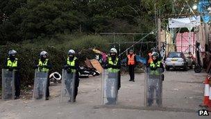 Police at the main entrance to Dale Farm