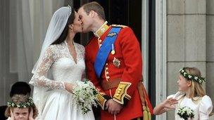 The Duke and Duchess of Cambridge kiss on the balcony of Buckingham Palace after the Royal Wedding