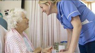 Nurse with elderly patient