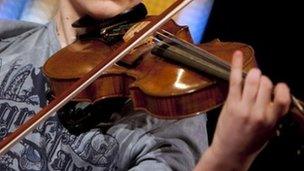 Youngster playing violin