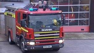 Fire engine leaving a station in west Wales