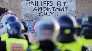 Riot police prepare to evict travellers and their supporters from Dale Farm, near Basildon, east of London, on October 19, 2011