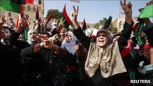 Women celebrate the Muammar Gaddafi's death in Tripoli, 21 October 2011