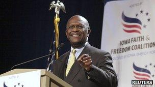 Herman Cain speaks at the Iowa Faith Freedom Coalition's Presidential Forum at the Iowa State Fairgrounds in Des Moines, Iowa, 22 October 2011