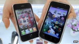 Apple's iPhone 3GS alongside Samsung's Galaxy S handset