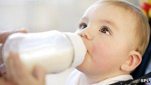 A baby drinking milk