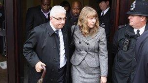 Mitch Winehouse, Amy Winehouse's father, and her stepmother Jane leave St Pancras Coroners Court