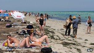 Tourists on a beach near Djerba