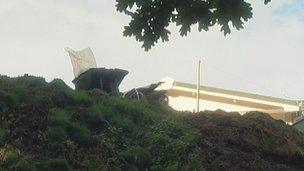 The mound of fly-tipped waste in the garden of a property in Botany Bay Road in Southampton