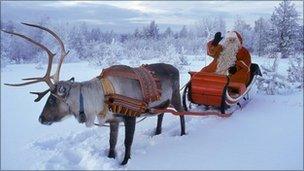 Father Christmas and reindeer in Lapland
