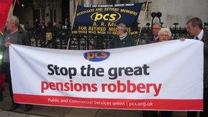 Public sector trade unionists protest outside a High Court hearing on the use of CPI instead of RPI to inflation proof their pensions.