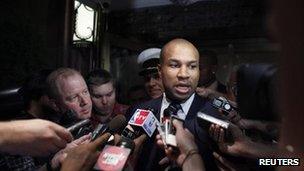 NBA Players Association President and Los Angeles Lakers' Derek Fisher speaks to reporters on 10 October 2011