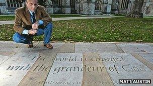 Dr Mack and the inscription outside Exeter Cathedral: Pic Matt Austin