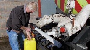 Jonathan Griffiths filling a container from a Severn Trent tanker