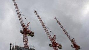 Cranes on building site