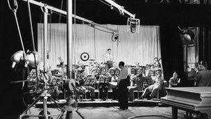 An orchestra is used to test thehe Marconi-EMI system