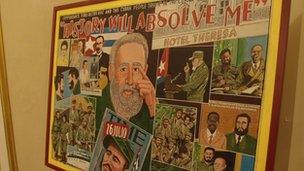 A mural of Fidel Castro images with the label "History will absolve me"