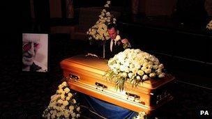 The golden coffin of Sir Jimmy Savile inside the Queens Hotel in Leeds