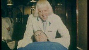 Sir Jimmy Savile working as a hospital porter