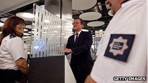 David Cameron at Heathrow border control