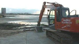 Clearing Margate beach